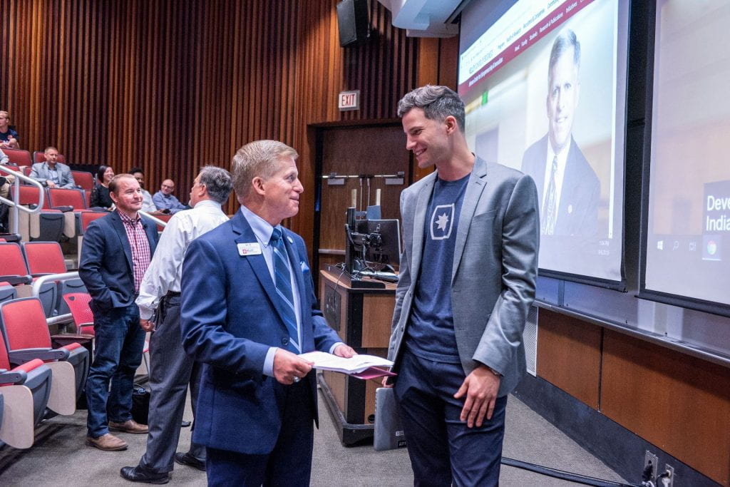 Donald Kuratko is speaking with someone at the IU Entrepreneurial Connection Day took place on September 6, 2019