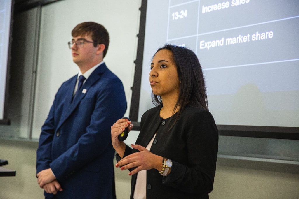 Students in I-Core present their findings to faculty and company representatives.