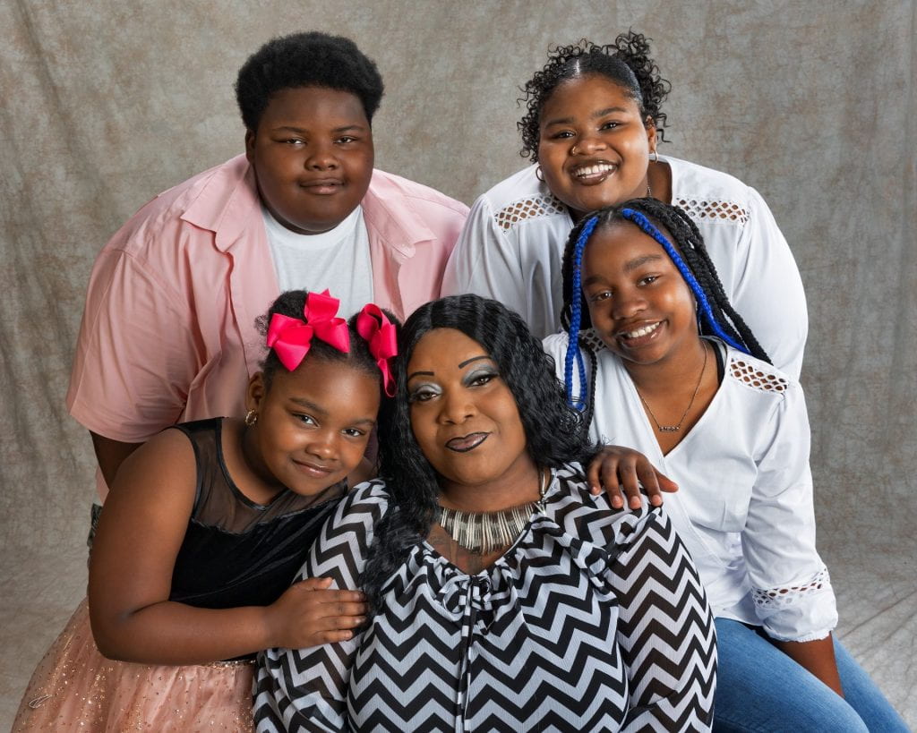 Cherri Morris and her four grandchildren in a family portrait